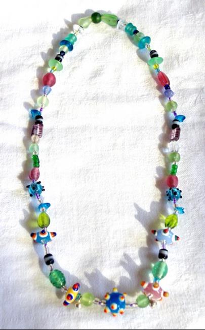 Art: cartwheel necklace by Artist Chris Jeanguenat