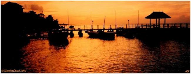 Art: Tropical Sunset with Boats by Artist Lar Shackelford