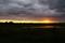 Art: Stormy Sunrise by Artist Lisa Miller
